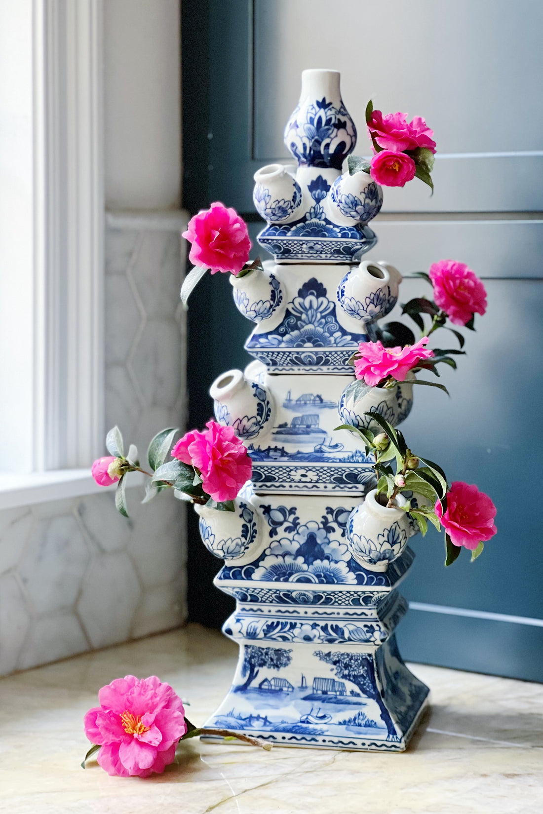 hadn't painted blue and white tulipiere with hot pink camellias from House of Modern Vintage 