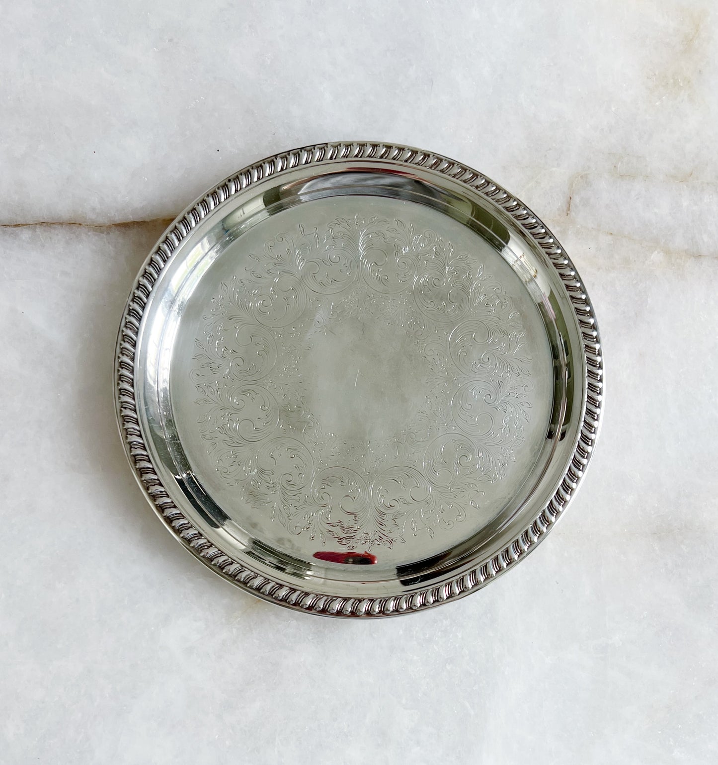 Vintage etched silver serving trays headed