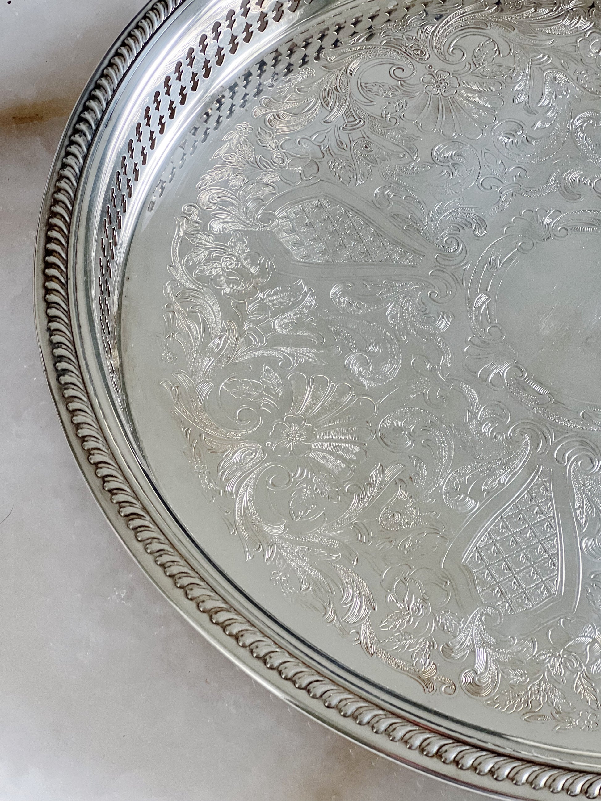 Vintage silver serving trays headed with reticulated edges 