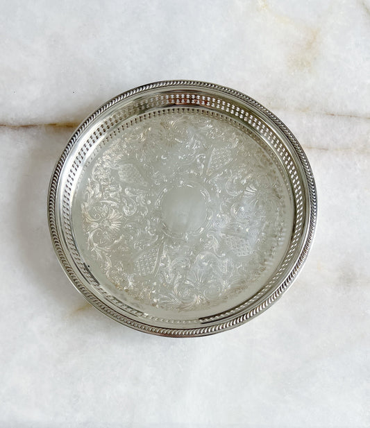 Vintage silver serving trays headed with reticulated edges 