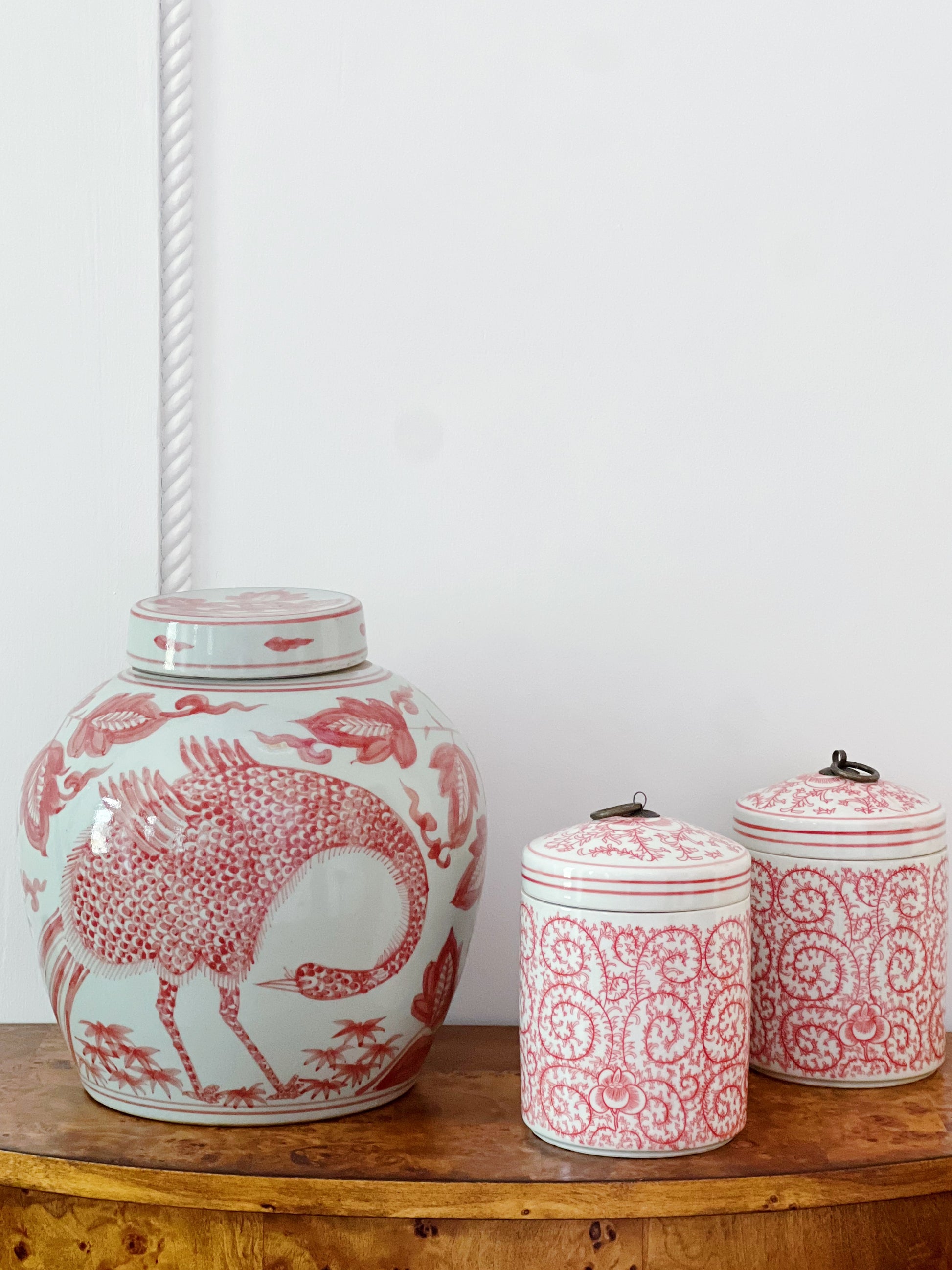 Red and white ginger jar and two red and white scrolling peony tea jars