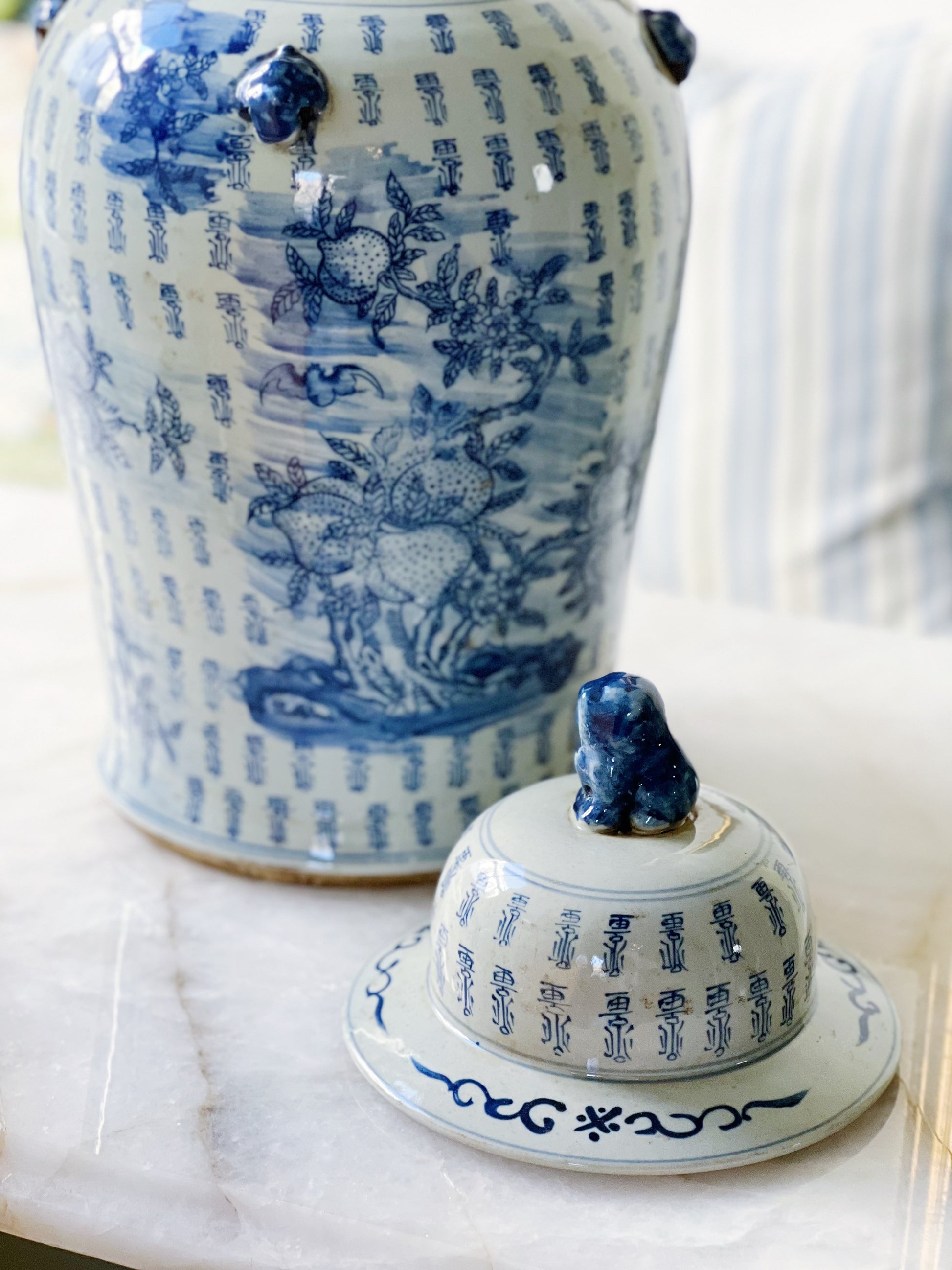 Blue and white hand painted temple jar with foo dog lid