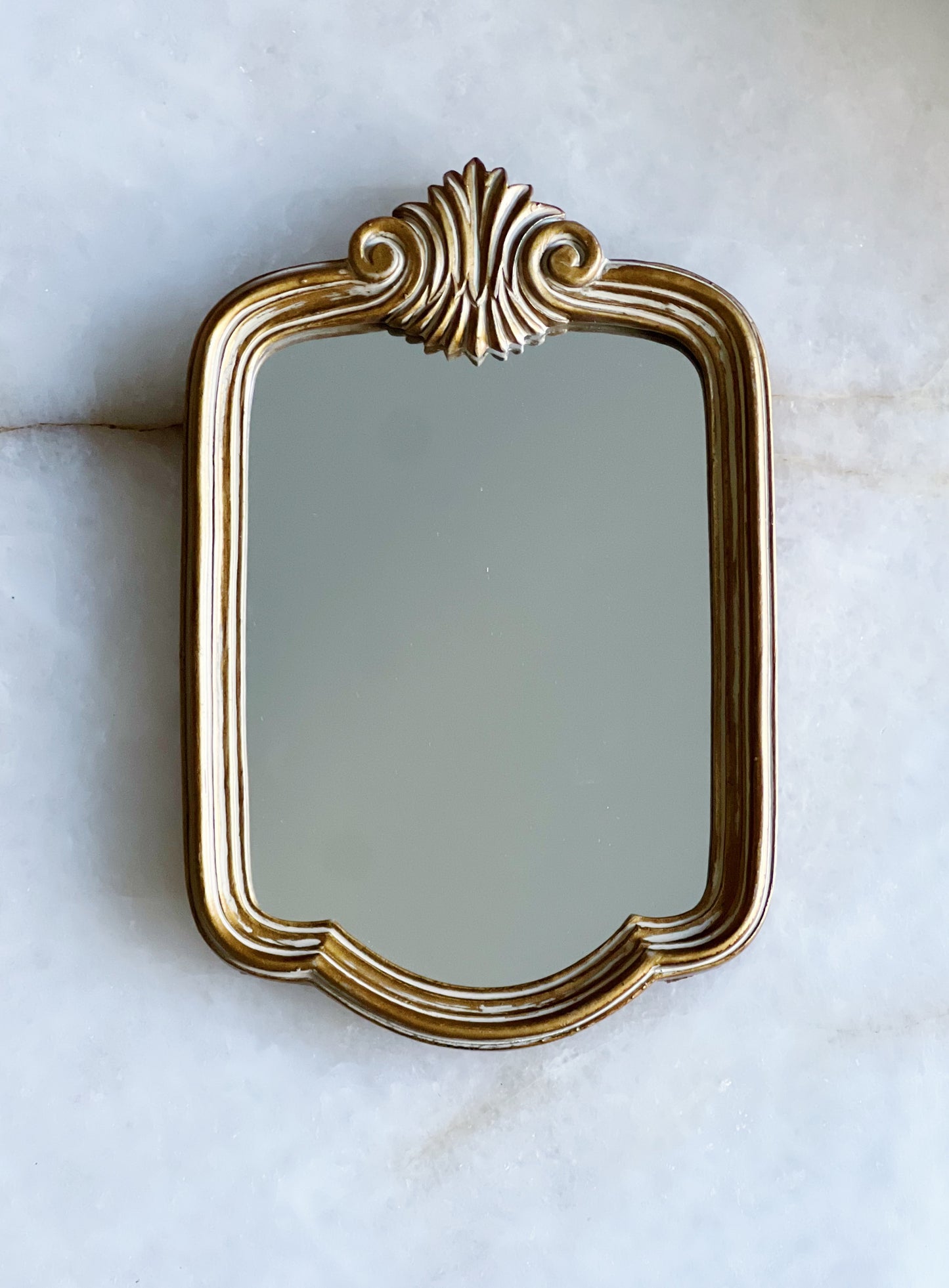 Small gold florentine mirror