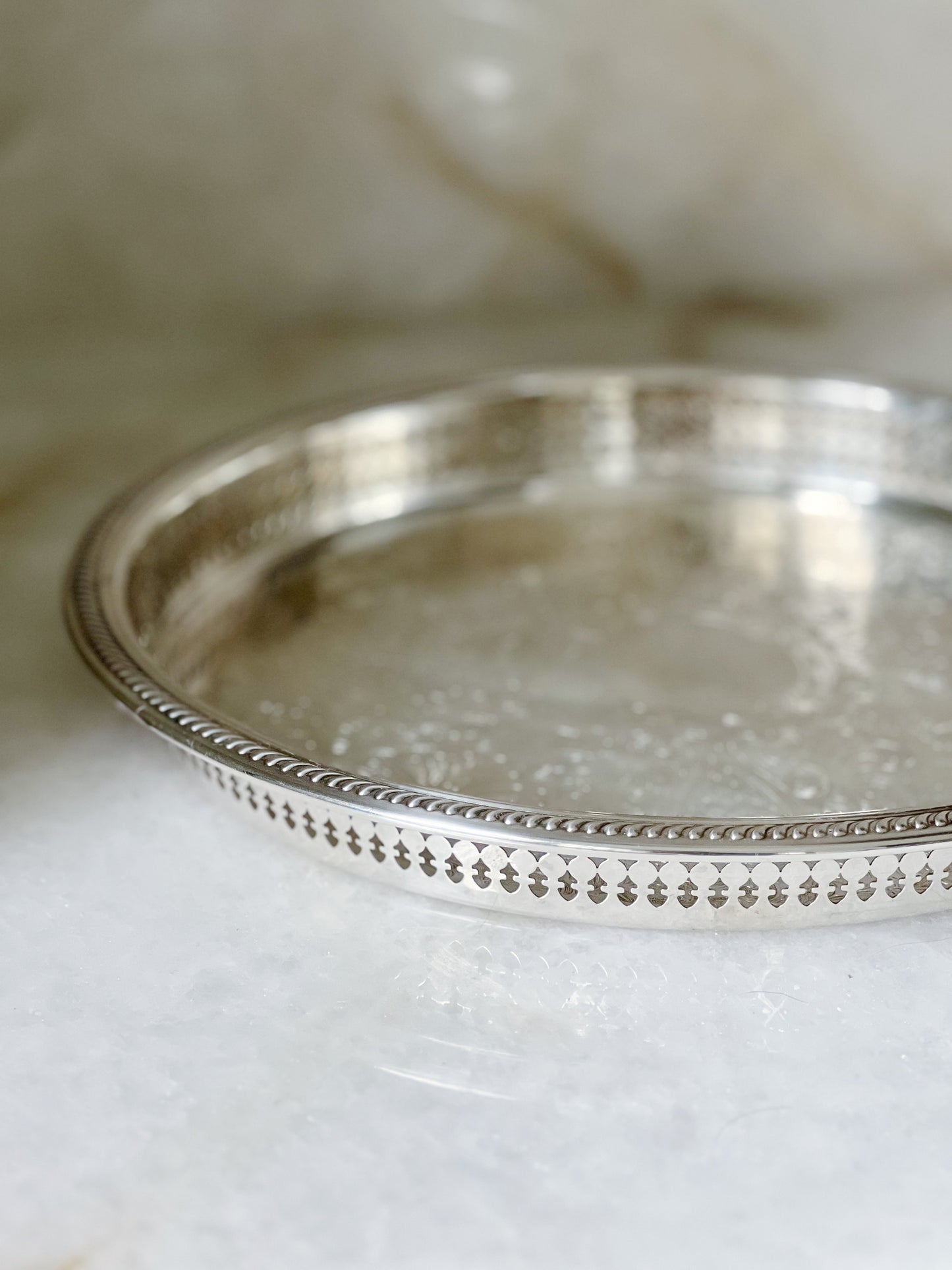 Vintage silver serving trays headed with reticulated edges 