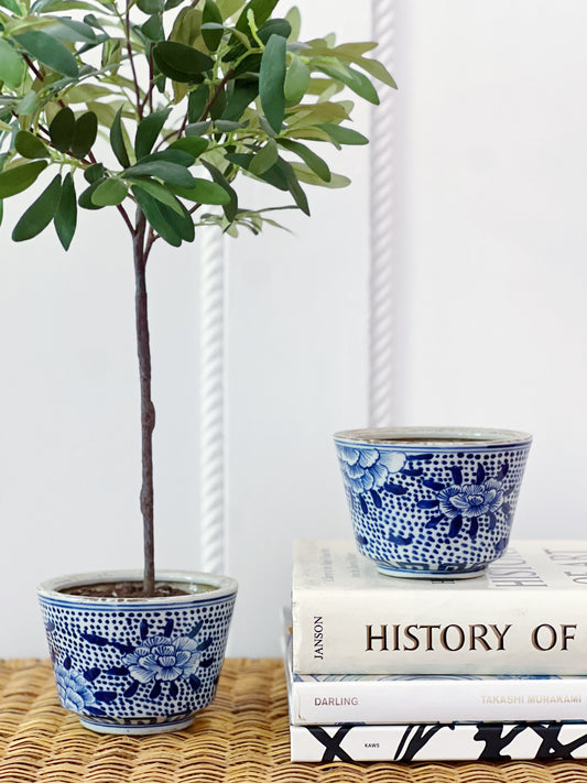 set of two blue and white peony cache pot with topiary and books