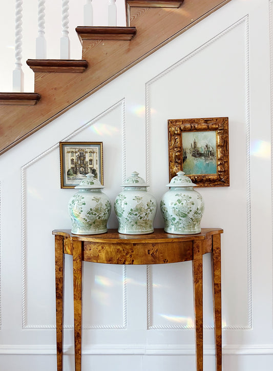 Green and white ginger jar on vintage furniture 