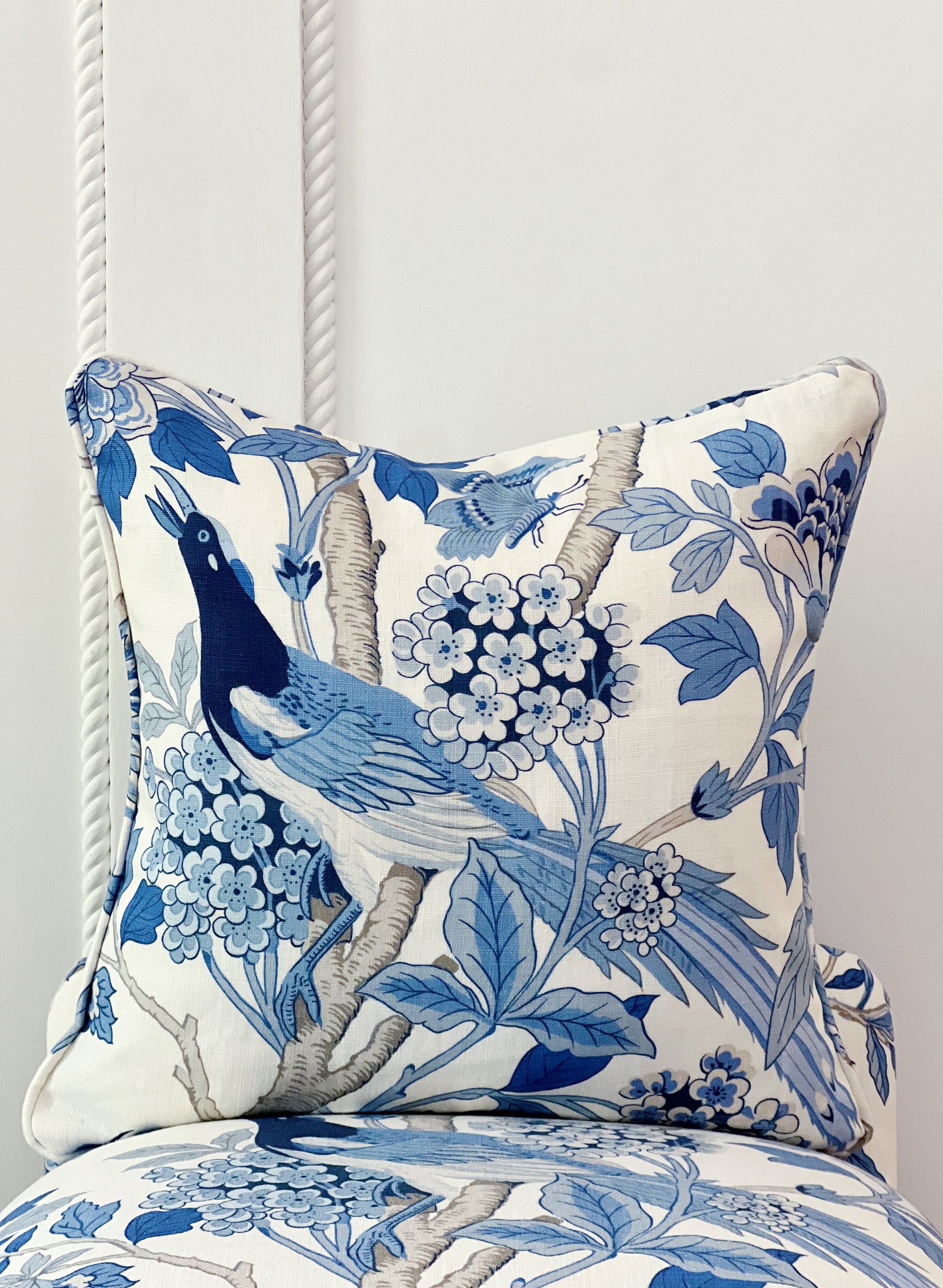 custom pillow in GP & J Baker hydrangea bird fabric on a recovered vintage furniture 